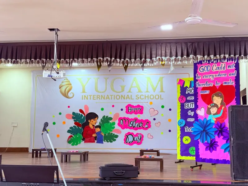 The school auditorium stage set for an event