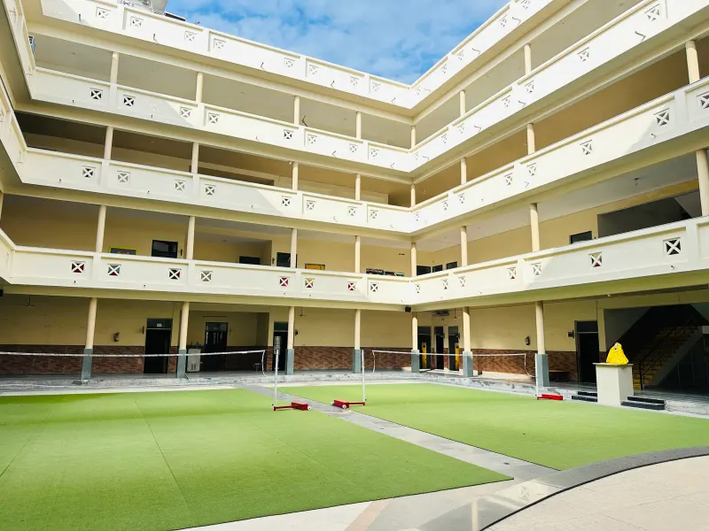 Central courtyard with lush green turf