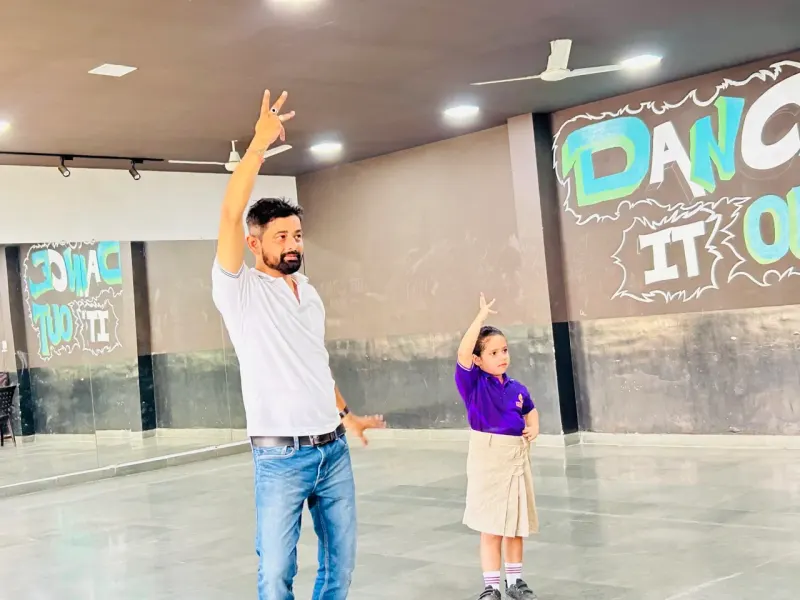 Instructor teaching dance choreography