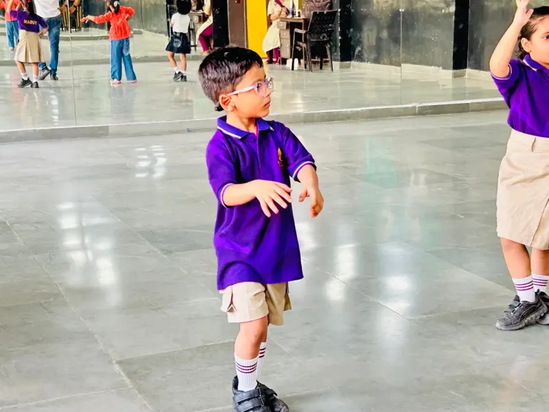 Young student enjoying a dance session