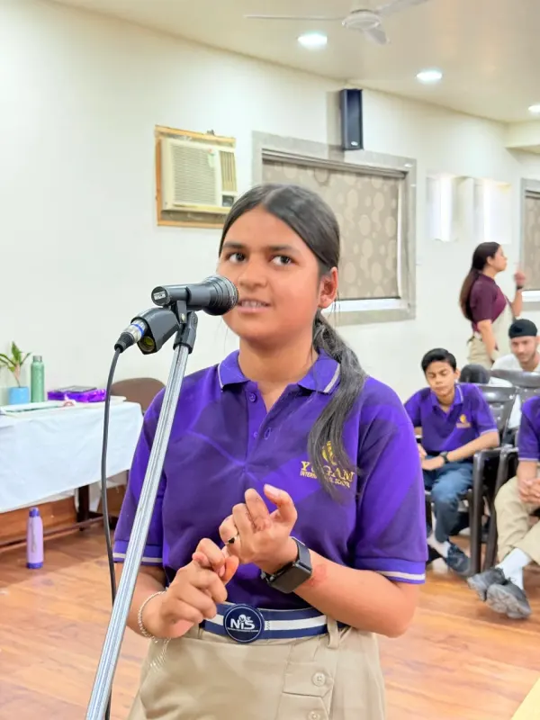 A Yugam student speaking at the Samvaad podium